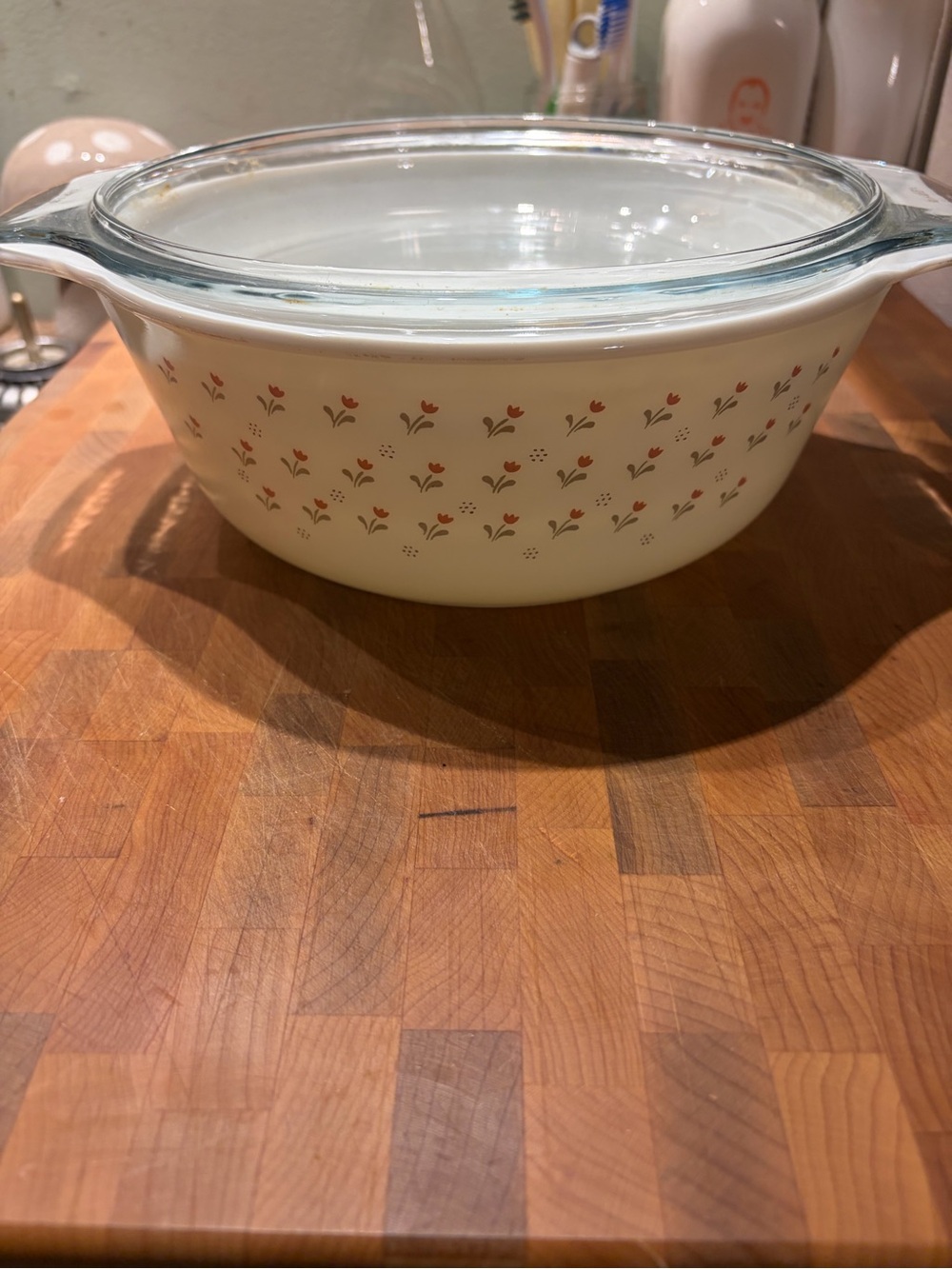 Pyrex tulip Casserole Dish with Red Floral Pattern and Clear Glass Lid